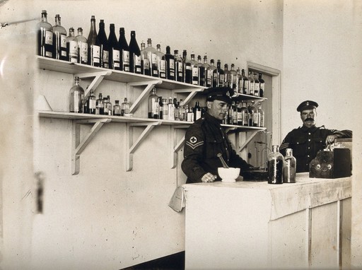 Military dispensary with two R.A.F. medical officers; interior. Photograph, ca. 1945?